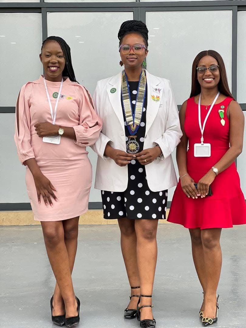 Three Ladies’ Circle leaders wearing club insignia
